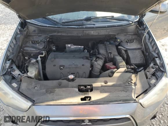 2015 Mitsubishi Outlander ES with VIN 4A4AP3AU2FE062121, listed as a Copart auction lot 82533585 with 168,980 mi miles and Salvage title. Bid and sale history available at DreamBid. Image 12.