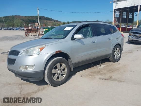 ✅ 2012 Chevrolet Traverse 1LT • VIN: 1GNKRGED7CJ156772 • Lot: 43373687. Wystawiony na IAAI z przebiegiem 117 596 mil. Bezpłatny archiwum sprzedaży aukcyjnych z USA i szczegółowy raport historii pojazdu na DreamBid. Zdjęcie 2.