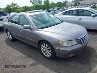 2006 Hyundai Azera SE z VIN KMHFC46F06A107049, wystawiony jako IAAI lot #42638717 z przebiegiem 158 094 mil mil oraz . Historia ofert i sprzedaży dostępna na DreamBid. Obrazek 1.