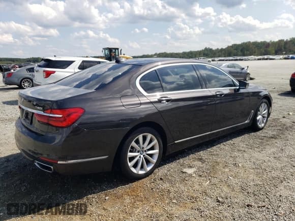 ✅ 2016 BMW 7 Series 740i • VIN: WBA7E2C56GG504506 • Лот: 81659585. Опубликован ранее на Copart с пробегом 93 842 миль. Бесплатный доступ к архиву аукционных продаж из США и подробный отчёт об истории автомобиля на DreamBid. Изображение 3.