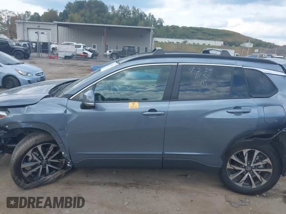 ✅ 2024 Toyota Corolla Cross XLE • VIN: 7MUDAABG5RV111321 • Lot: 43171380. Listed on IAAI with 7,682 mi. Free auction sales archive from the USA and detailed vehicle history report at DreamBid. Image 14.