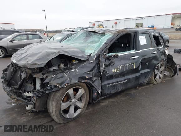 ✅ 2015 Jeep Grand Cherokee Overland • VIN: 1C4RJFCG3FC665854 • Lot: 41697999. Listed on IAAI with 206,618 mi. Free auction sales archive from the USA and detailed vehicle history report at DreamBid. Image 17.
