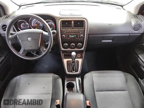 ✅ 2010 Dodge Caliber SXT • VIN: 1B3CB4HA9AD602340 • Лот: 83538394. Опубликован ранее на Copart с пробегом 125 145 миль. Бесплатный доступ к архиву аукционных продаж из США и подробный отчёт об истории автомобиля на DreamBid. Изображение 8.