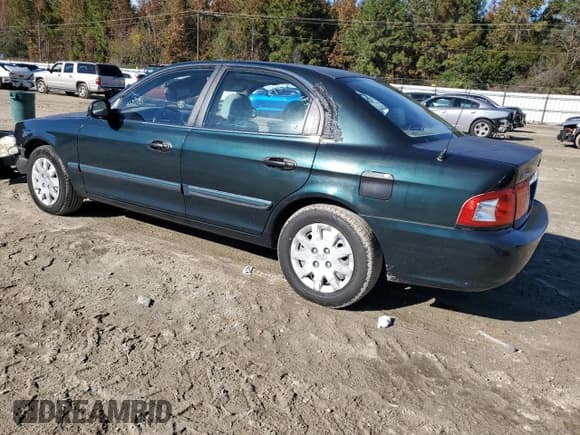 ✅ 2005 Kia Optima LX • VIN: KNAGD126X55383320 • Lot: 91072635. Listed on Copart with 108,994 mi. Free auction sales archive from the USA and detailed vehicle history report at DreamBid. Image 2.