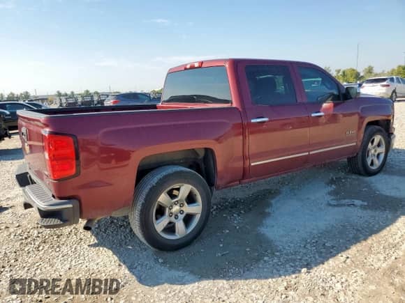 2015 Chevrolet Silverado 1500 LT with VIN 3GCPCREC7FG297544, listed as a Copart auction lot 82291355 with 133,901 mi miles and Salvage title. Bid and sale history available at DreamBid. Image 3.