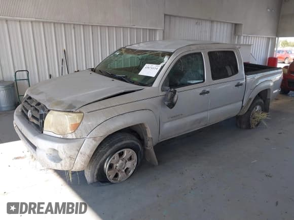 ✅ 2008 Toyota Tacoma PreRunner • VIN: 3TMJU62N58M055203 • Lot: 43674114. Listed on IAAI with 104,583 mi. Free auction sales archive from the USA and detailed vehicle history report at DreamBid. Image 2.
