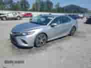 2020 Toyota Camry SE with VIN 4T1G11BK0LU012075, listed as a Copart auction lot 80863605 with 119,754 mi miles and Salvage title. Bid and sale history available at DreamBid. Image 1.