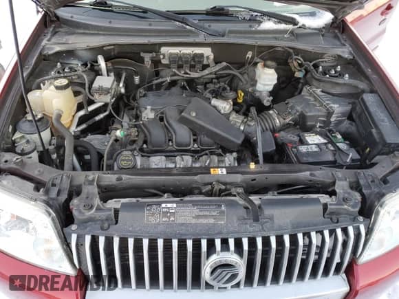 2006 Mercury Mariner Luxury with VIN 4M2YU56146DJ09769, listed as a Copart auction lot 87851795 with 80,894 mi miles and Salvage title. Bid and sale history available at DreamBid. Image 12.