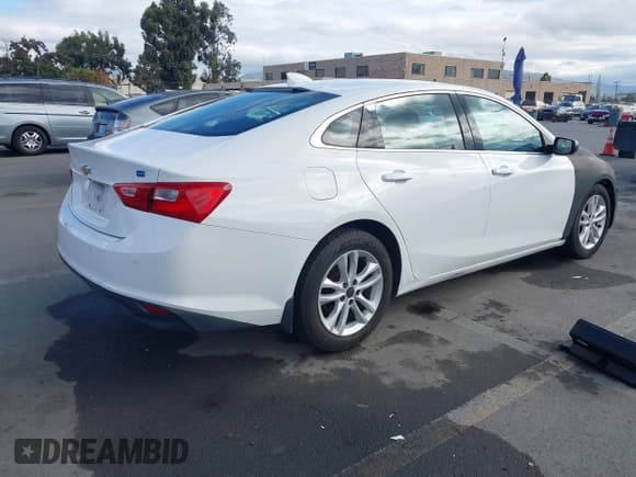 ✅ 2018 Chevrolet Malibu Hybrid • VIN: 1G1ZF5SU8JF140033 • Lot: 43673797. Listed on IAAI with 111,657 mi. Free auction sales archive from the USA and detailed vehicle history report at DreamBid. Image 4.