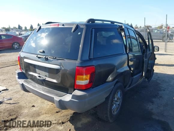 ✅ 2004 Jeep Grand Cherokee Laredo • VIN: 1J4GX48S84C401673 • Lot: 43657580. Listed on IAAI with Not provided. Free auction sales archive from the USA and detailed vehicle history report at DreamBid. Image 4.