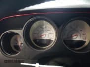 ✅ 2014 Dodge Challenger SXT • VIN: 2C3CDYAG1EH181709 • Lot: 77967864. Wystawiony na Copart z przebiegiem Nie podano. Bezpłatny archiwum sprzedaży aukcyjnych z USA i szczegółowy raport historii pojazdu na DreamBid. Zdjęcie 9.