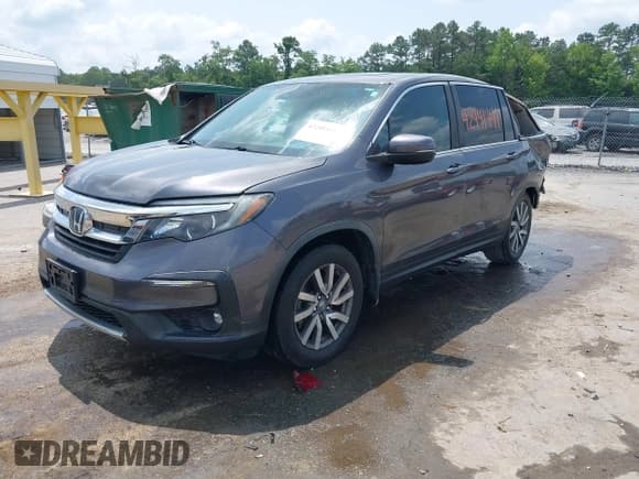 ✅ 2019 Honda Pilot EX-L • VIN: 5FNYF5H4XKB018306 • Lot: 42441441. Wystawiony na IAAI z przebiegiem 53 212 mil. Bezpłatny archiwum sprzedaży aukcyjnych z USA i szczegółowy raport historii pojazdu na DreamBid. Zdjęcie 18.