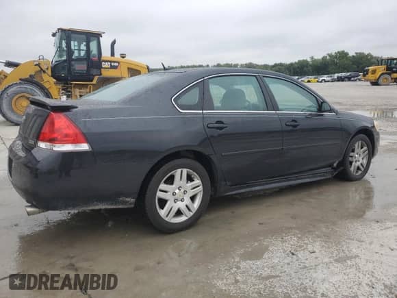 2012 Chevrolet Impala LT Retail с VIN 2G1WB5E35C1172563, выставлен на аукционе Copart как лот 81587465 с пробегом 170 749 миль миль и Списание • Salvage title. История ставок и продаж доступна на DreamBid. Изображение 3.