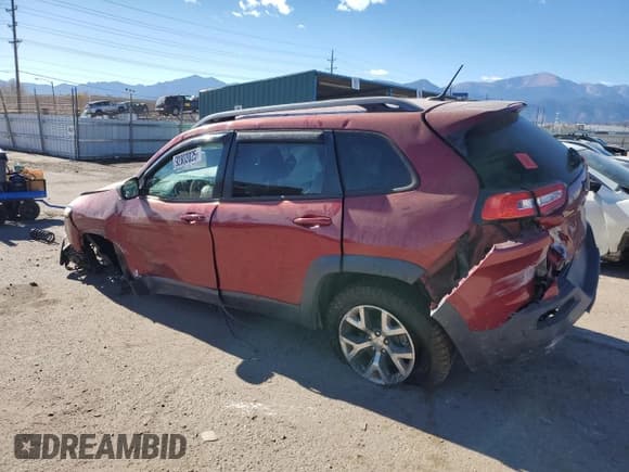 ✅ 2015 Jeep Cherokee Trailhawk • VIN: 1C4PJMBS4FW577590 • Lot: 92803025. Listed on Copart with 163,417 mi. Free auction sales archive from the USA and detailed vehicle history report at DreamBid. Image 2.
