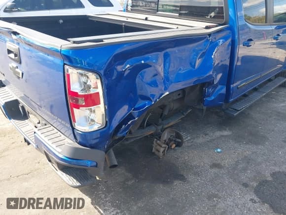 ✅ 2020 Chevrolet Colorado 2WD LT • VIN: 1GCGSCEN3L1214610 • Lot: 41796734. Listed on IAAI with 49,311 mi. Free auction sales archive from the USA and detailed vehicle history report at DreamBid. Image 6.