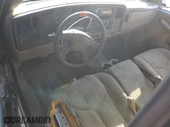 2004 Chevrolet Silverado 1500 LS z VIN 1GCEC14V74Z103166, wystawiony jako Copart lot #77694504 z przebiegiem 327 931 mil mil oraz Czysty tytuł • Clean title. Historia ofert i sprzedaży dostępna na DreamBid. Obrazek 8.