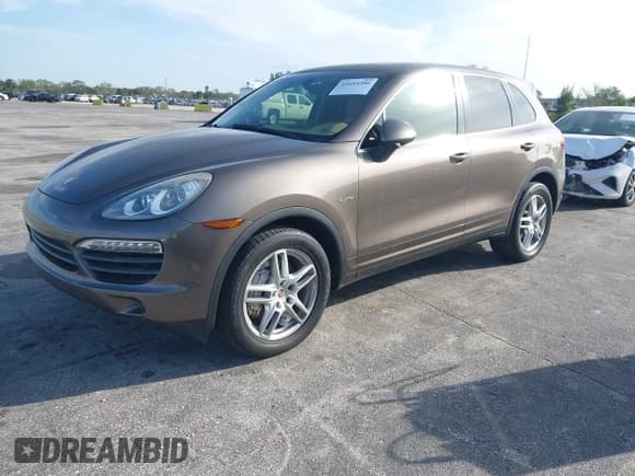 ✅ 2011 Porsche Cayenne S Hybrid • VIN: WP1AE2A29BLA94414 • Lot: 41644386. Wystawiony na IAAI z przebiegiem 76 095 mil. Bezpłatny archiwum sprzedaży aukcyjnych z USA i szczegółowy raport historii pojazdu na DreamBid. Zdjęcie 2.
