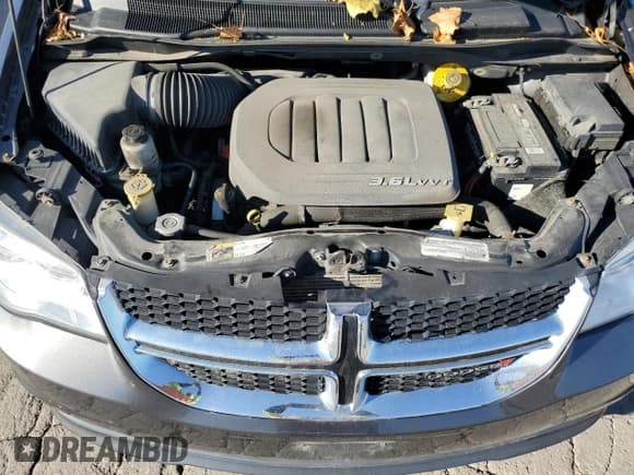 ✅ 2015 Dodge Grand Caravan SXT • VIN: 2C4RDGCG5FR531142 • Lot: 93193345. Listed on Copart with 183,308 mi. Free auction sales archive from the USA and detailed vehicle history report at DreamBid. Image 12.