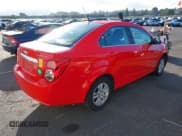 ✅ 2014 Chevrolet Sonic LT • VIN: 1G1JC5SH1E4191254 • Lot: 43253273. Listed on IAAI with 104,251 mi. Free auction sales archive from the USA and detailed vehicle history report at DreamBid. Image 4.