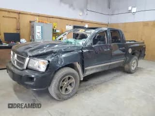 ✅ 2008 Dodge Dakota Laramie • VIN: 1D7HW58N68S608156 • Lot: 58475684. Wystawiony na Copart z przebiegiem 238 043 mil. Bezpłatny archiwum sprzedaży aukcyjnych z USA i szczegółowy raport historii pojazdu na DreamBid. Zdjęcie 1.