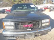 ✅ 1999 GMC Suburban • VIN: 3GKEC16R6XG549656 • Lot: 41403259. Wystawiony na IAAI z przebiegiem 306 548 mil. Bezpłatny archiwum sprzedaży aukcyjnych z USA i szczegółowy raport historii pojazdu na DreamBid. Zdjęcie 6.