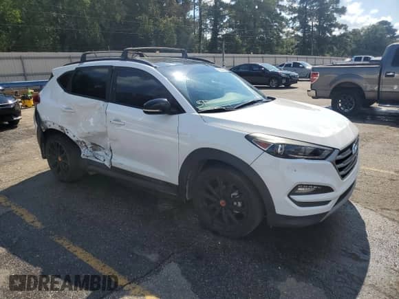 2017 Hyundai Tucson Sport z VIN KM8J33A24HU557040, wystawiony jako Copart lot #85887885 z przebiegiem 113 488 mil mil oraz Szkoda całkowita • Salvage title. Historia ofert i sprzedaży dostępna na DreamBid. Obrazek 4.