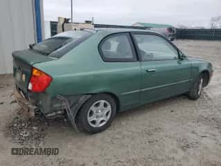 2005 Hyundai Accent GLS z VIN KMHCG35C05U356585, wystawiony jako Copart lot #40091384 z przebiegiem 60 289 mil mil oraz Szkoda całkowita • Salvage title. Historia ofert i sprzedaży dostępna na DreamBid. Obrazek 3.