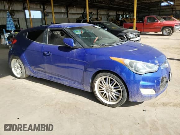 2013 Hyundai Veloster RE:MIX z VIN KMHTC6AD1DU139704, wystawiony jako Copart lot #67167074 z przebiegiem 155 099 mil mil oraz Szkoda całkowita • Salvage title. Historia ofert i sprzedaży dostępna na DreamBid. Obrazek 4.