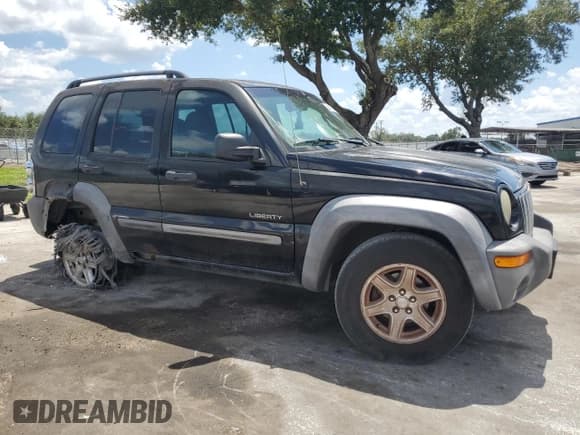 ✅ 2004 Jeep Liberty Sport • VIN: 1J4GL48K04W249026 • Lot: 69427045. Listed on Copart with 181,262 mi. Free auction sales archive from the USA and detailed vehicle history report at DreamBid. Image 4.