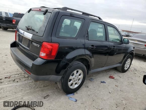 ✅ 2009 Mazda Tribute Touring • VIN: 4F2CZ02739KM03047 • Lot: 43086245. Wystawiony na Copart z przebiegiem 164 566 mil. Bezpłatny archiwum sprzedaży aukcyjnych z USA i szczegółowy raport historii pojazdu na DreamBid. Zdjęcie 3.
