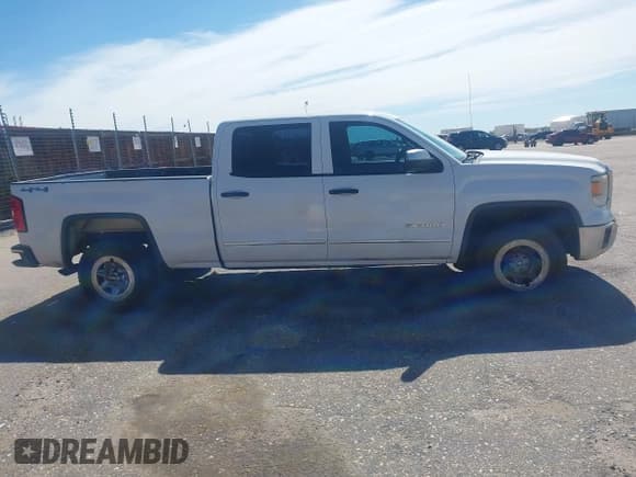 ✅ 2014 GMC Sierra 1500 • VIN: 3GTU2TEC4EG443898 • Лот: 42092835. Опубликован ранее на IAAI с пробегом 208 876 миль. Бесплатный доступ к архиву аукционных продаж из США и подробный отчёт об истории автомобиля на DreamBid. Изображение 13.