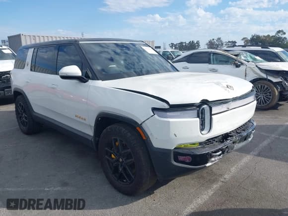 ✅ 2023 Rivian R1S Adventure • VIN: 7PDSGABA6PN017536 • Lot: 43515847. Wystawiony na IAAI z przebiegiem 21 072 mil. Bezpłatny archiwum sprzedaży aukcyjnych z USA i szczegółowy raport historii pojazdu na DreamBid. Zdjęcie 1.