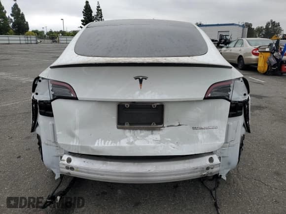 ✅ 2022 Tesla Model Y Performance • VIN: 7SAYGDEF9NF465682 • Lot: 71891945. Listed on Copart with 52,423 mi. Free auction sales archive from the USA and detailed vehicle history report at DreamBid. Image 6.
