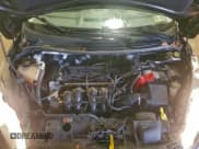 ✅ 2014 Ford Fiesta SE • VIN: 3FADP4EJ4EM165582 • Lot: 95875615. Wystawiony na Copart z przebiegiem 33 989 mil. Bezpłatny archiwum sprzedaży aukcyjnych z USA i szczegółowy raport historii pojazdu na DreamBid. Zdjęcie 11.