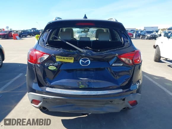✅ 2016 Mazda CX-5 Grand Touring • VIN: JM3KE2DY5G0715623 • Lot: 43582561. Wystawiony na IAAI z przebiegiem 166 935 mil. Bezpłatny archiwum sprzedaży aukcyjnych z USA i szczegółowy raport historii pojazdu na DreamBid. Zdjęcie 16.