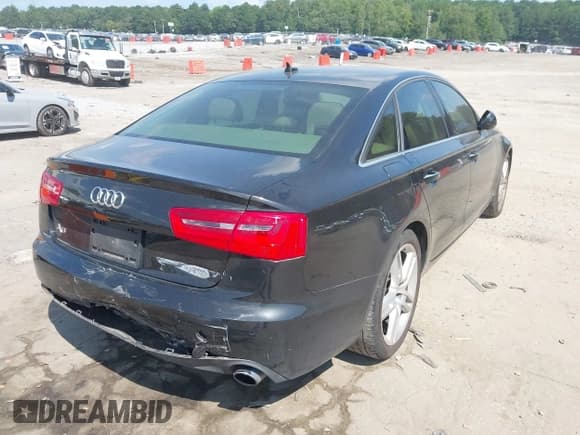 ✅ 2014 Audi A6 Premium Plus • VIN: WAUGFAFC1EN035769 • Лот: 42951782. Опубликован ранее на IAAI с пробегом 156 316 миль. Бесплатный доступ к архиву аукционных продаж из США и подробный отчёт об истории автомобиля на DreamBid. Изображение 4.