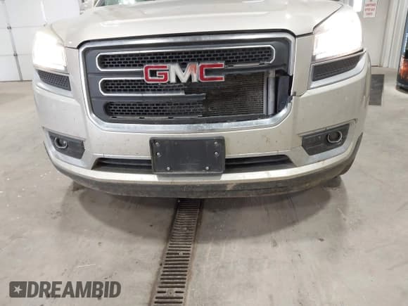 ✅ 2015 GMC Acadia SLT • VIN: 1GKKVSKD1FJ301342 • Lot: 43566026. Listed on IAAI with 103,023 mi. Free auction sales archive from the USA and detailed vehicle history report at DreamBid. Image 6.