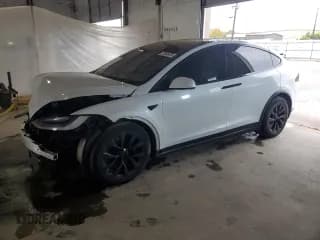 ✅ 2023 Tesla Model X • VIN: 7SAXCBE58PF403745 • Lot: 70048405. Wystawiony na Copart z przebiegiem 52 680 mil. Bezpłatny archiwum sprzedaży aukcyjnych z USA i szczegółowy raport historii pojazdu na DreamBid. Zdjęcie 1.