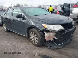 ✅ 2014 Toyota Camry XLE • VIN: 4T4BF1FK1ER364452 • Lot: 43723423. Listed on IAAI with 273,784 mi. Free auction sales archive from the USA and detailed vehicle history report at DreamBid. Image 1.