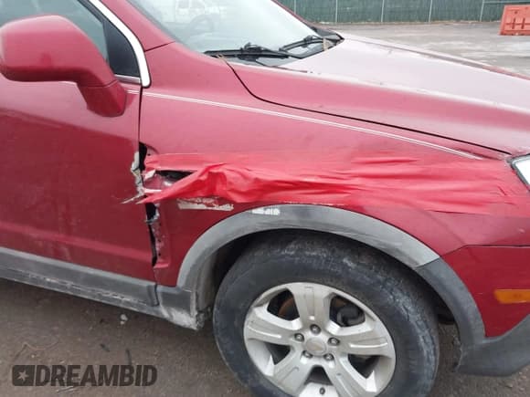 ✅ 2013 Chevrolet Captiva Sport LS • VIN: 3GNAL2EK8DS598538 • Lot: 41464085. Wystawiony na IAAI z przebiegiem 200 865 mil. Bezpłatny archiwum sprzedaży aukcyjnych z USA i szczegółowy raport historii pojazdu na DreamBid. Zdjęcie 6.