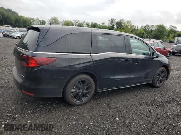✅ 2023 Honda Odyssey Sport • VIN: 5FNRL6H78PB057559 • Лот: 69699725. Опубликован ранее на Copart с пробегом 34 699 миль. Бесплатный доступ к архиву аукционных продаж из США и подробный отчёт об истории автомобиля на DreamBid. Изображение 3.