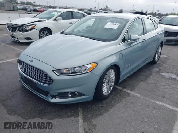 ✅ 2014 Ford Fusion SE Luxury • VIN: 3FA6P0PUXER343832 • Lot: 42533915. Listed on IAAI with 91,642 mi. Free auction sales archive from the USA and detailed vehicle history report at DreamBid. Image 2.