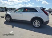 ✅ 2020 Cadillac XT4 FWD Luxury • VIN: 1GYAZAR47LF039864 • Лот: 72799314. Опубликован ранее на Copart с пробегом 123 294 миль. Бесплатный доступ к архиву аукционных продаж из США и подробный отчёт об истории автомобиля на DreamBid. Изображение 2.