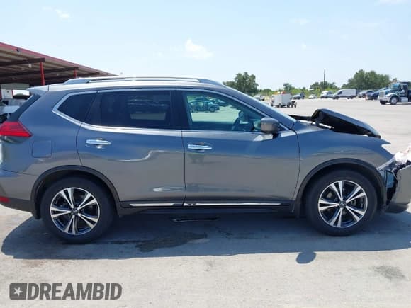 ✅ 2017 Nissan Rogue SV • VIN: 5N1AT2MT7HC855814 • Lot: 42972829. Listed on IAAI with 80,195 mi. Free auction sales archive from the USA and detailed vehicle history report at DreamBid. Image 14.