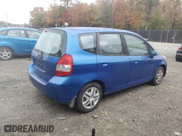 ✅ 2007 Honda Fit • VIN: JHMGD38407S028454 • Лот: 90257875. Опубликован ранее на Copart с пробегом 248 317 миль. Бесплатный доступ к архиву аукционных продаж из США и подробный отчёт об истории автомобиля на DreamBid. Изображение 3.