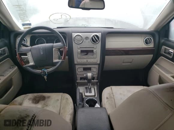 ✅ 2006 Lincoln Zephyr • VIN: 3LNHM26166R615188 • Лот: 76311994. Опубликован ранее на Copart с пробегом Не указан. Бесплатный доступ к архиву аукционных продаж из США и подробный отчёт об истории автомобиля на DreamBid. Изображение 8.