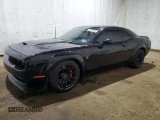 ✅ 2021 Dodge Challenger • VIN: NJ1659E • Lot: 42813565. Wystawiony na Copart z przebiegiem 28 061 mil. Bezpłatny archiwum sprzedaży aukcyjnych z USA i szczegółowy raport historii pojazdu na DreamBid. Zdjęcie 1.