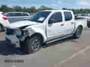 2014 Nissan Frontier Desert Runner z VIN 1N6AD0ER1EN768304, wystawiony jako IAAI lot #43281195 z przebiegiem 115 362 mil mil oraz . Historia ofert i sprzedaży dostępna na DreamBid. Obrazek 18.