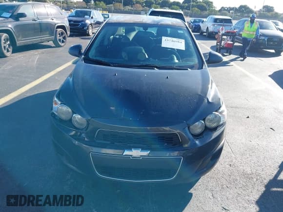 ✅ 2014 Chevrolet Sonic LT • VIN: 1G1JC5SH7E4188357 • Lot: 43746984. Listed on IAAI with 149,212 mi. Free auction sales archive from the USA and detailed vehicle history report at DreamBid. Image 12.