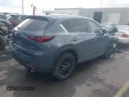 ✅ 2022 Mazda CX-5 S Carbon Edition • VIN: JM3KFBCM9N1633932 • Lot: 42246486. Listed on IAAI with 39,516 mi. Free auction sales archive from the USA and detailed vehicle history report at DreamBid. Image 4.